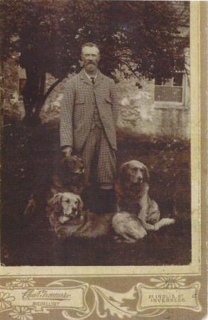 Guisachan stalker, Simon Fraser, with three dogs 1903. Dogs are Comet (the darkest), Conan (in front) and Ginger. Image courtesy of Donnie Stirling
