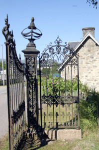 These iron gates once stood in front of the mansion. They  now mark the entrance to several historical buildings renovated as Tomich Holidays.